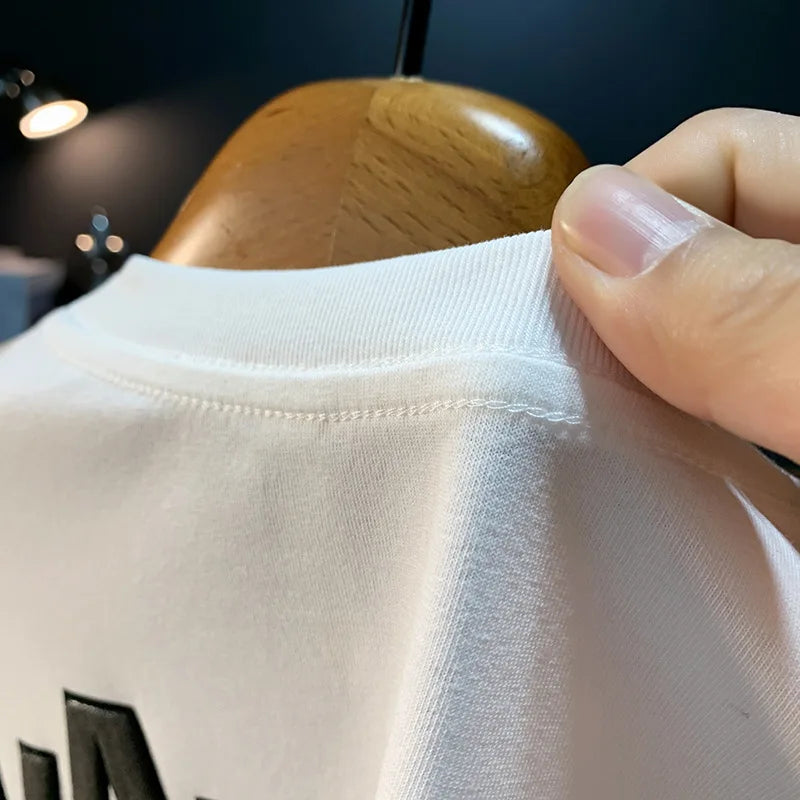 Ink embossed letter short sleeved T-shirt for men